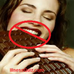 This is a woman who is getting pleasure from chocolates.